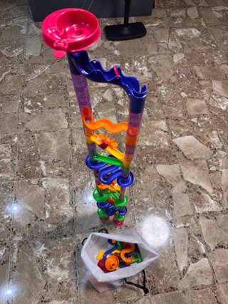 Juego de canicas y tubos