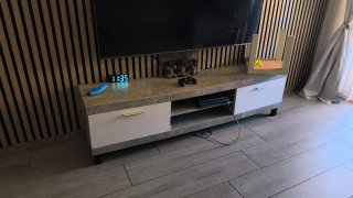 Mueble de salón gris y blanci