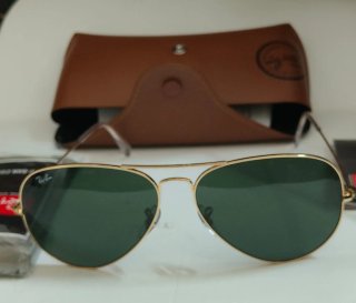 Gafas de sol Ray-Ban Aviator doradas y verdes
