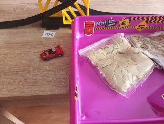 Pista de coches con arena y loop