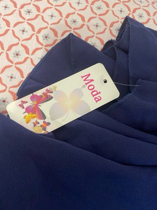 Blusa azul manga acampanada