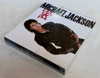 CD BAD NUEVO+LIBRO LEGEND-MICHAEL JACKSON-SIN USAR