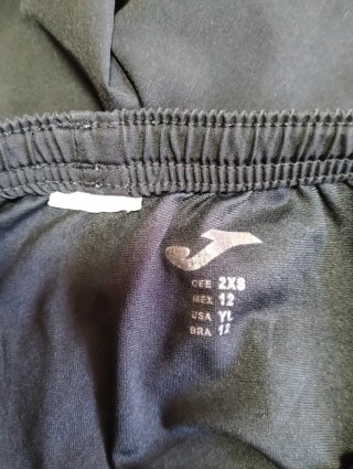 Pantalón corto atletismo Joma negro. Talla 12años.