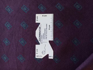 Tessuto fantasia geometrica bordeaux
