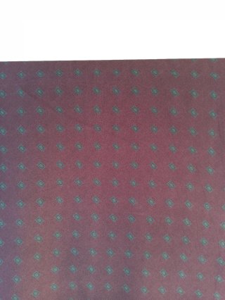 Tessuto fantasia geometrica bordeaux