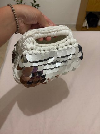 Borsa clutch bianca con paillettes argento