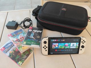 Nintendo Switch Blanca + 7 Juegos+ maletin de viaj