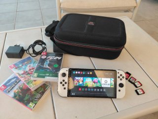 Nintendo Switch Blanca + 7 Juegos+ maletin de viaj