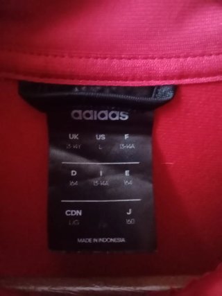 Chaqueta Adidas roja y negra talla XS de adulto