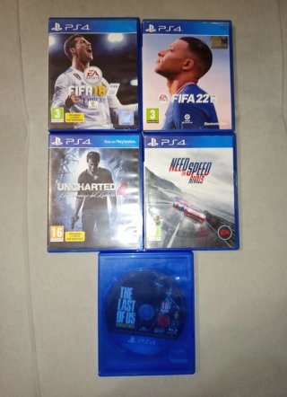 PS4 Slim 1TB + 4 Juegos + Mando + Cables.