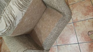 Sillón orejero tapizado impecable