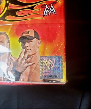 Caja WWE 2009 Topps Power Chipz Sellada