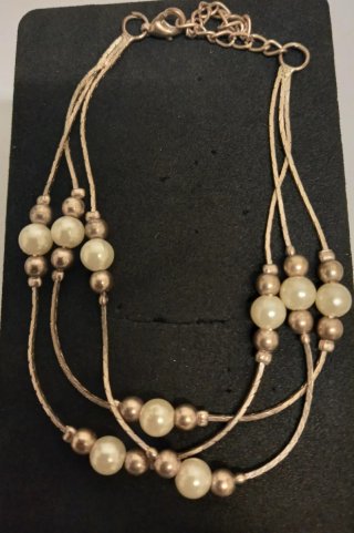 Pulsera multicadena con perlas