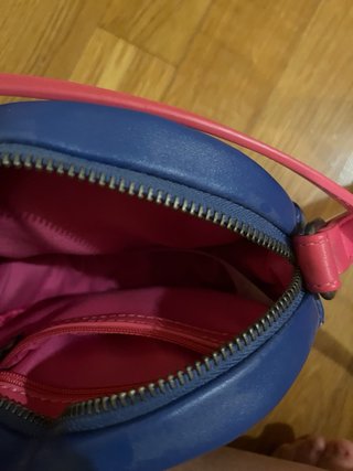 Bolso redondo reversible smiley azul y rosa