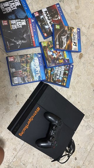Consola PS4 + 6 Juegos+maletin