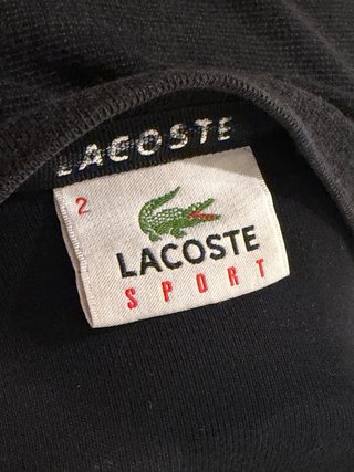 Polo Lacoste rayas hombre negro y amarillo