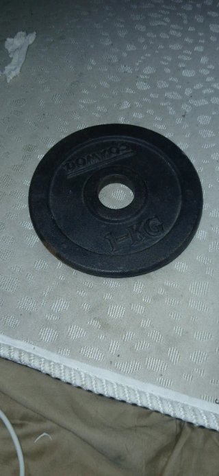 4 discos de pesas 1kg los 4 = 6€ / 1’5€ cada uno