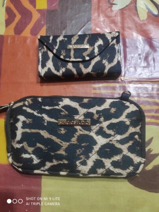 Estuche de maquillaje y neceser animal print