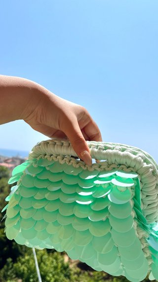 Clutch verde acqua con paillettes