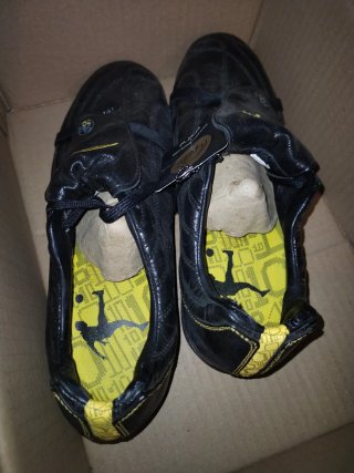 Botas de fútbol Pele negras y amarillas