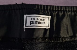 Falda negra de piel Pimkie