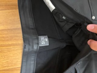 Jeans neri in pelle