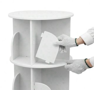 Estantería giratoria de madera blanca