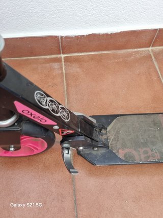 Patinete infantil rosa y negro