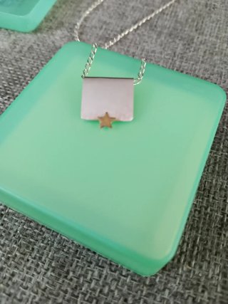Colgante plata y oro con estrella