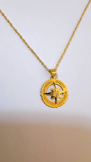 Collana con rosa dei venti in oro giallo 18kt 750