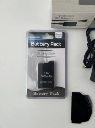 Batteria 3600mAh + Caricabatterie + Coperchio PSP