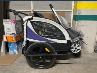 Carro porta niños para bicicleta