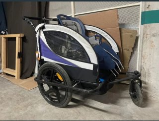 Carro porta niños para bicicleta