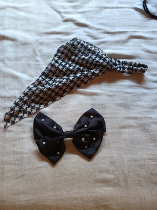Lazo negro con perlas