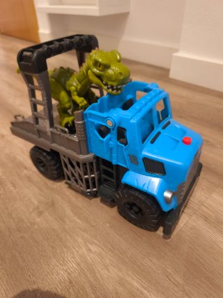 Camión de Juguete con Dinosaurio