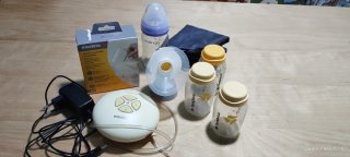 Sacaleches Medela + 3 botellas + biberón cristal