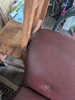 Sillón vintage de piel sintética granate
