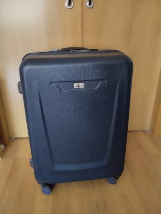 Maleta de viaje azul con 4 ruedas