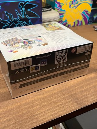 Caja Entrenador Élite Evoluciones Prismáticas