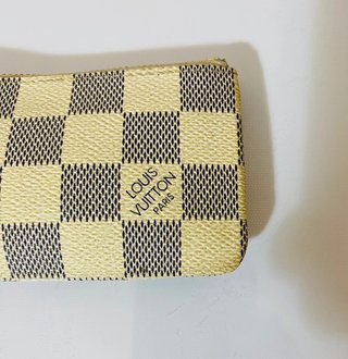 Pochette Luis Vuitton in pelle