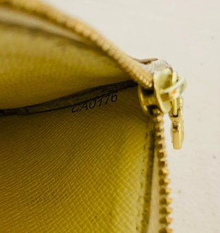 Pochette Luis Vuitton in pelle