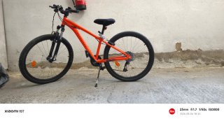Bicicleta Rockrider Naranja con complementos