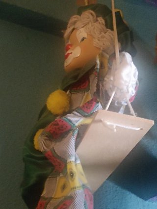 Payaso en columpio decorativo