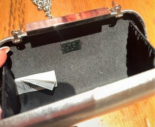 Clutch plateado Parfois