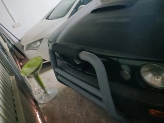 Barco con remolque y motores y Nissan Terrano.