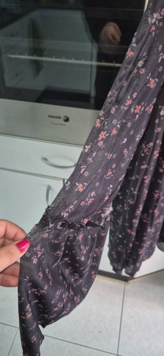 Blusa floral talla 54 con etiqueta