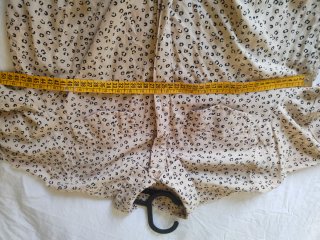 Blusa estampada animal print beige y negra