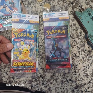 Pokemon Day 2026 Box con Moneta e Carte