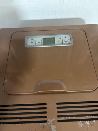 Hidroestufa de pellets con mando a distancia.