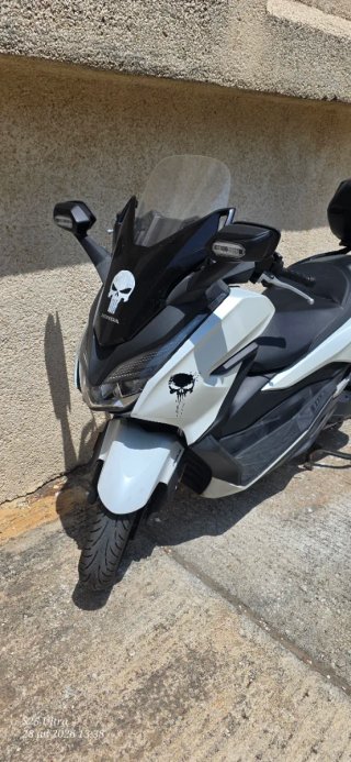 Honda Forza 125 Maxi Scooter.
